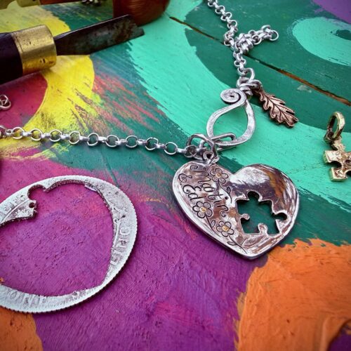 handmade and recycled silver coin love heart jigsaw necklace pendant