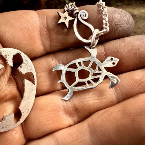 Handcrafted and recycled silver shilling Turtle necklace
