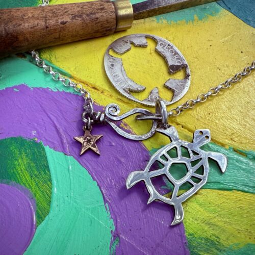 Handcrafted and recycled silver shilling Turtle necklace