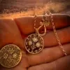 Handcrafted and up cycled edelweiss austrian shillin flower coin pendant necklace