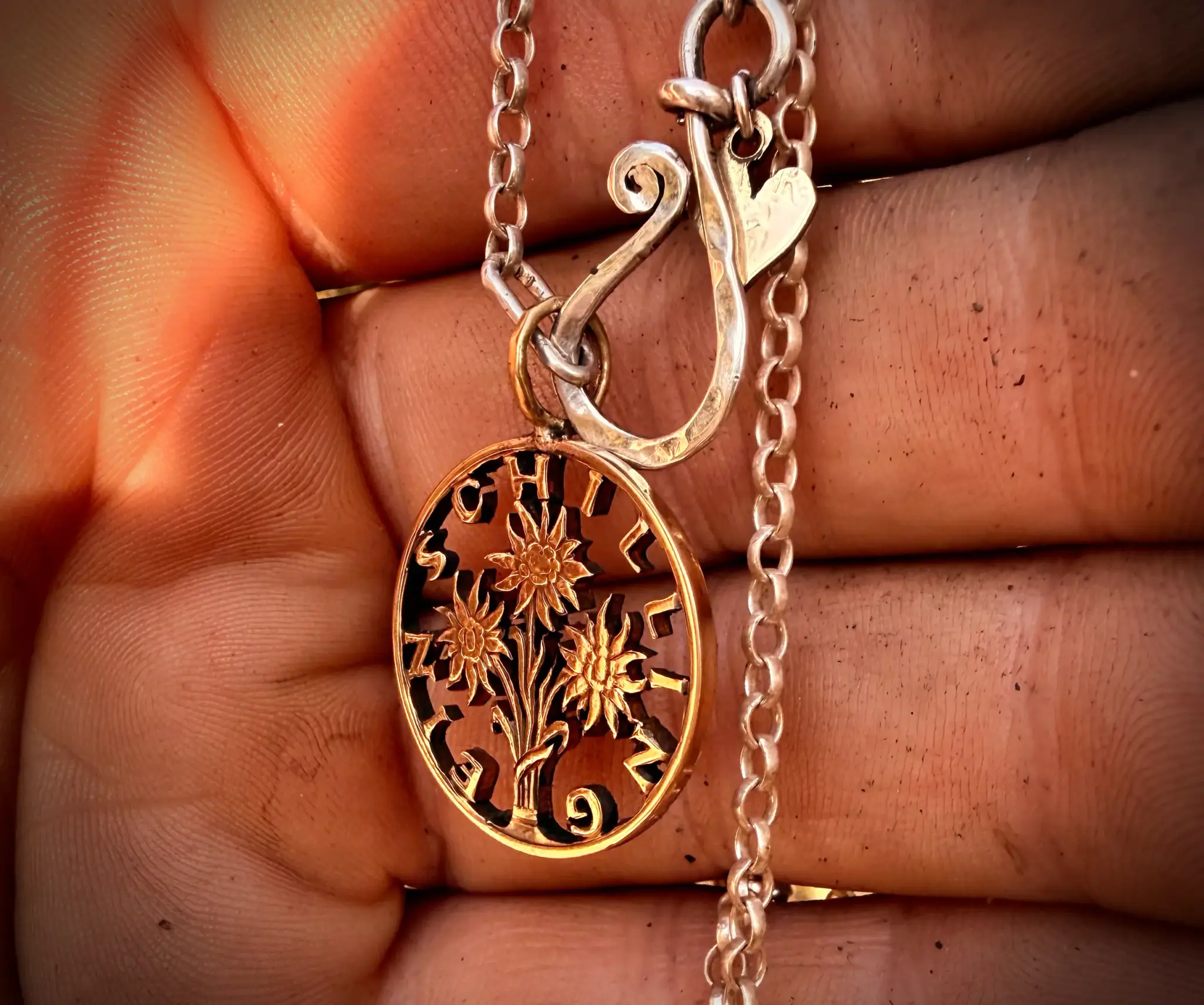 Handcrafted and up cycled edelweiss austrian shillin flower coin pendant necklace