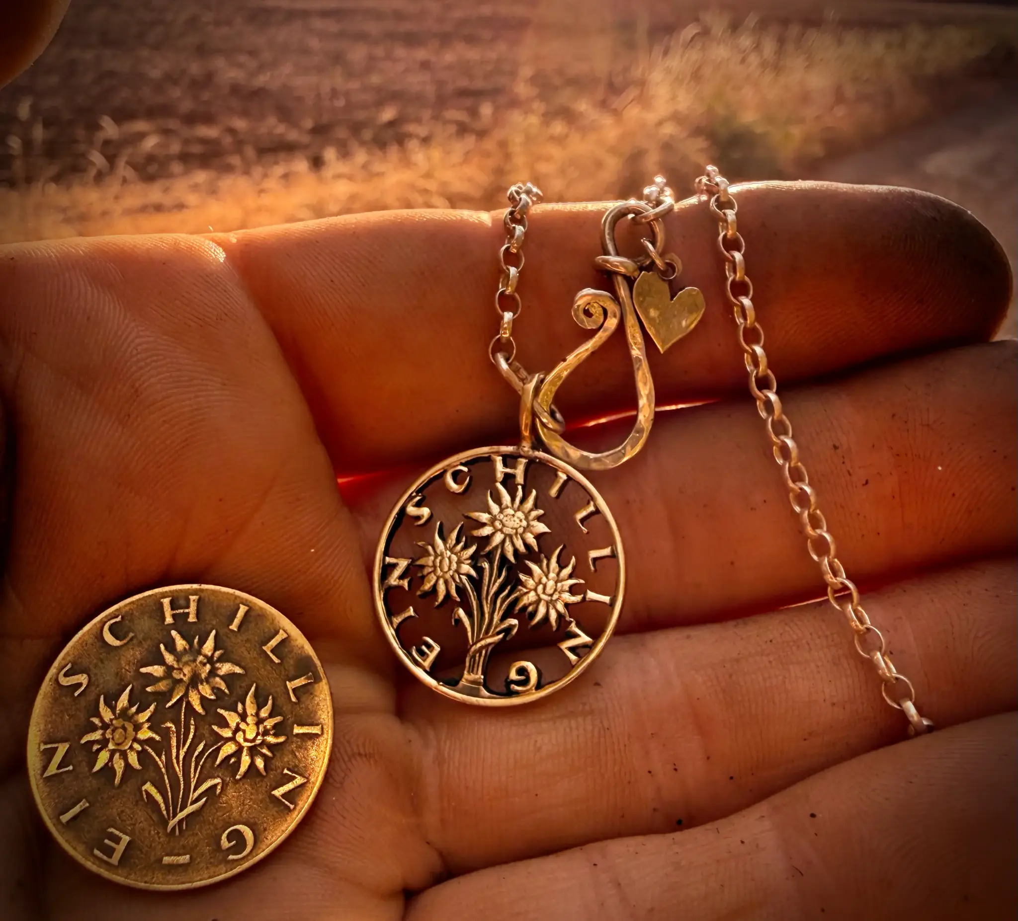 Handcrafted and up cycled edelweiss austrian shillin flower coin pendant necklace