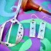 handcrafted and recycled spoon butterfly and dandelion clock earrings