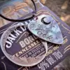handcrafted and recycled silver coin plectrum necklace