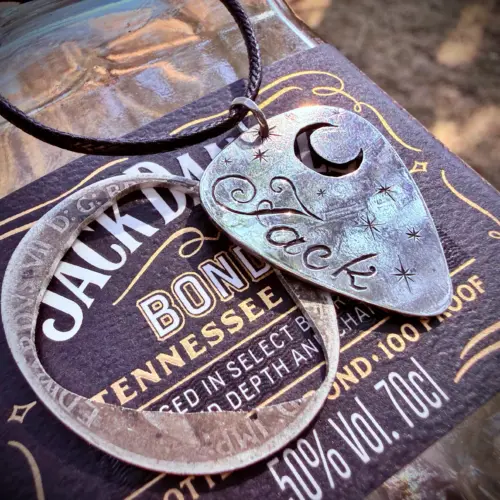 handcrafted and recycled silver coin plectrum necklace