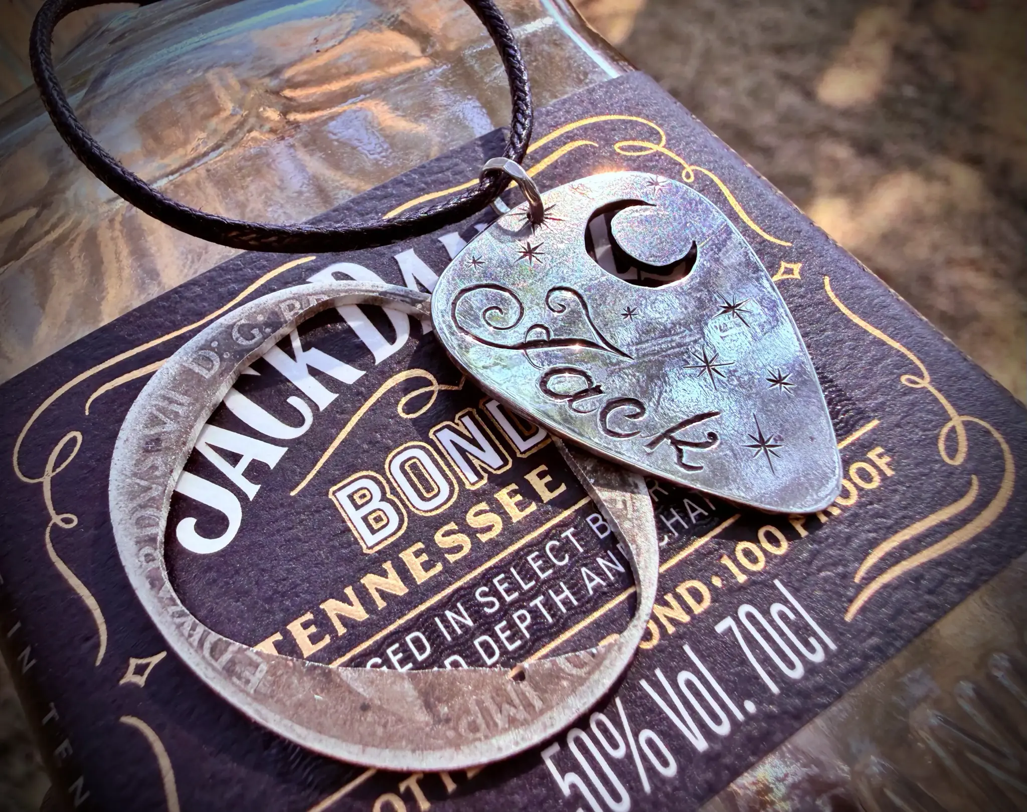 handcrafted and recycled silver coin plectrum necklace