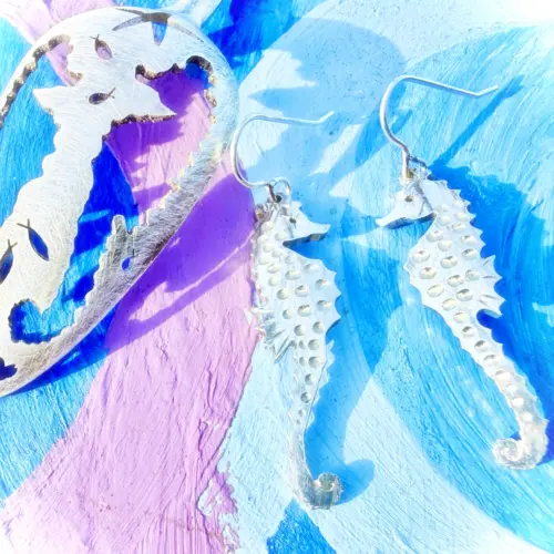 seahorse earrings ethically made with eco-conscious principles. Completely handmade and upcycled from an old antique spoon