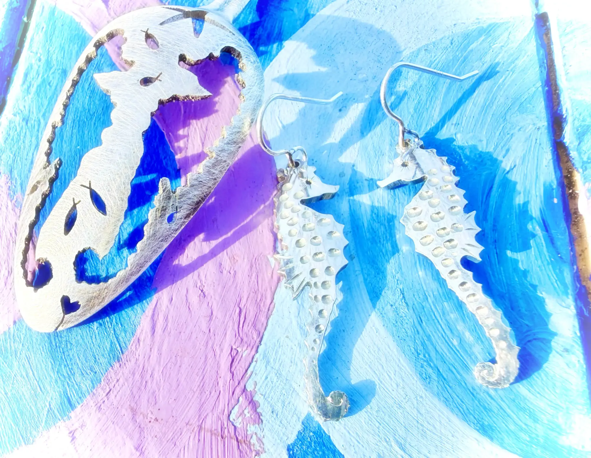 seahorse earrings ethically made with eco-conscious principles. Completely handmade and upcycled from an old antique spoon