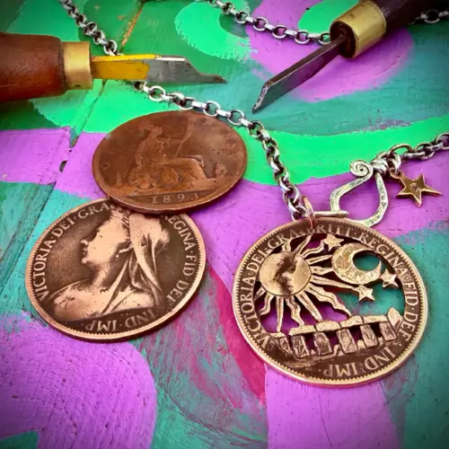 Stonehenge summer solstice coin pendant hand cut and carved in Cambridge, England by Hairy Growler