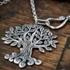 Fantastic tree of life necklace pendant handcrafted from a lovely old silver florin coin. Made in Cambridge, England by Hairy Growler