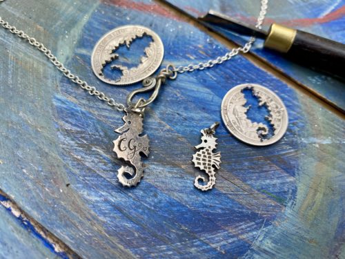 Handcrafted and ethical recycled silver shilling seahorse necklace pendant