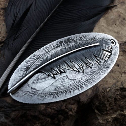 Raven girl feather necklace handmade and recycled silver