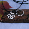 Handcrafted and recycled sterling silver shilling hawaiian flower necklace