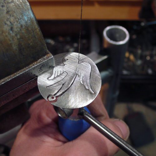 handmade and recycled silver coin swallow necklace pendant