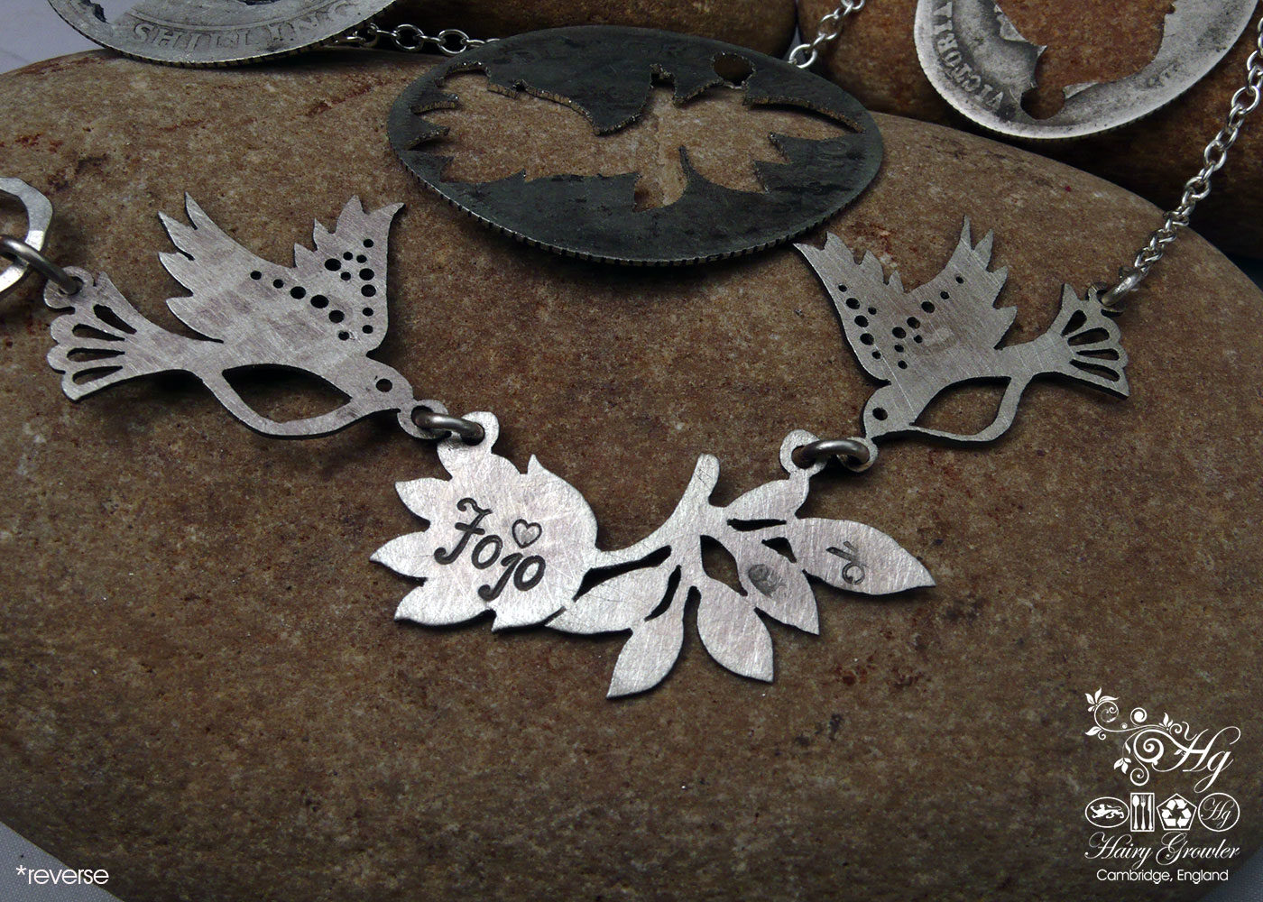 Handcrafted and recycled sterling silver beautiful sparkling doves and lotus flower necklace made from silver shillings