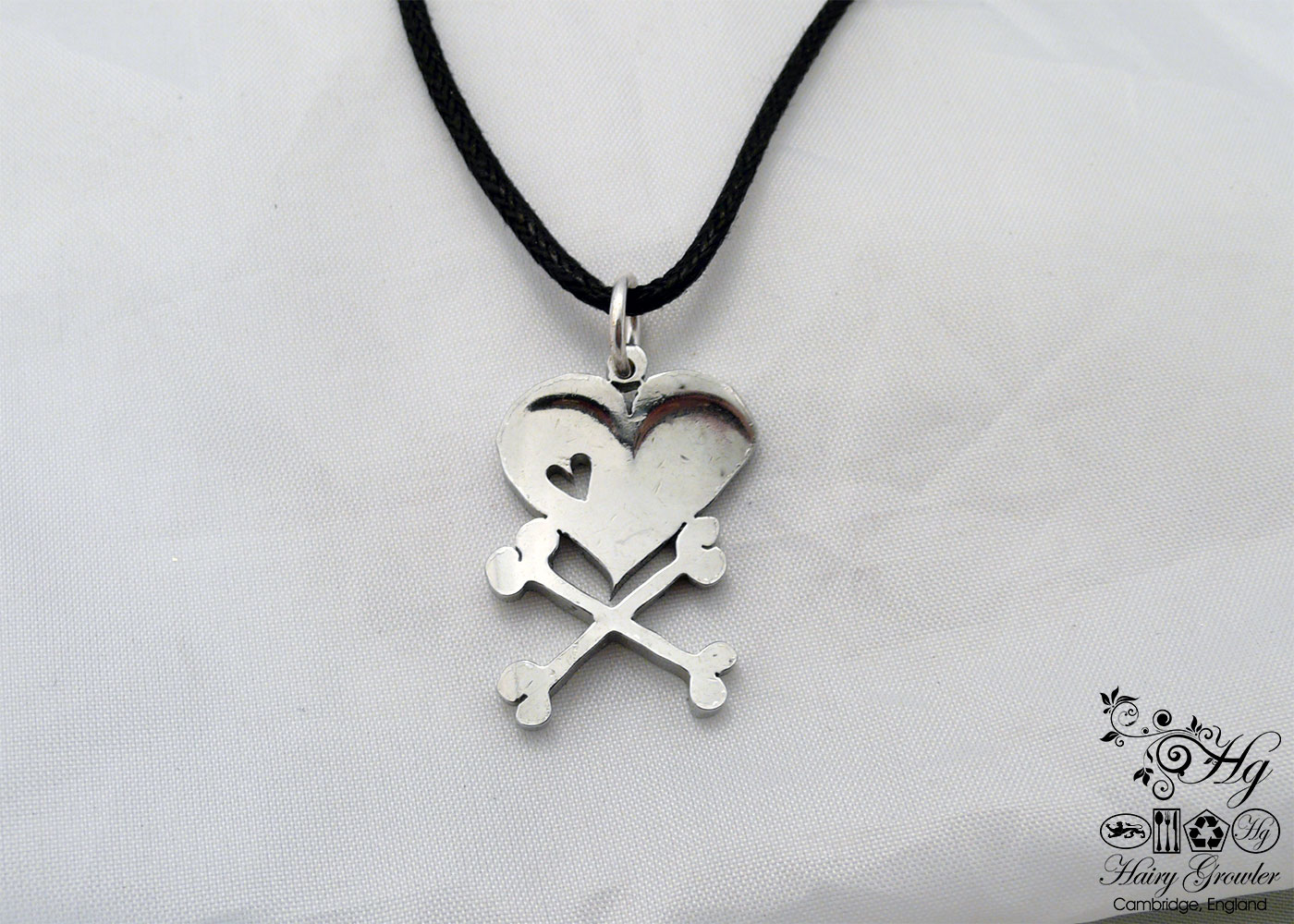 handcrafted and upcycled vintage spoon skull and crossbones necklace pendant
