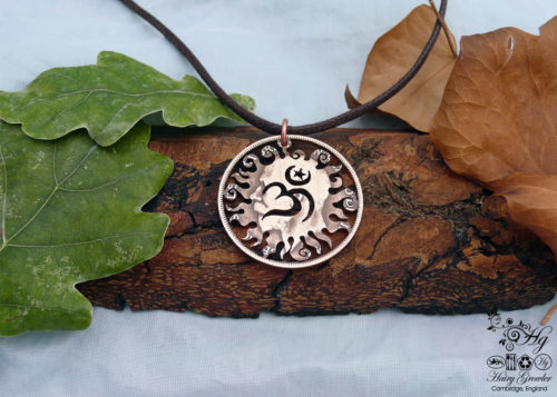 Handcrafted and recycled coin sun and om pendant necklace
