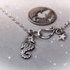 Handcrafted and repurposed silver shilling seahorse necklace