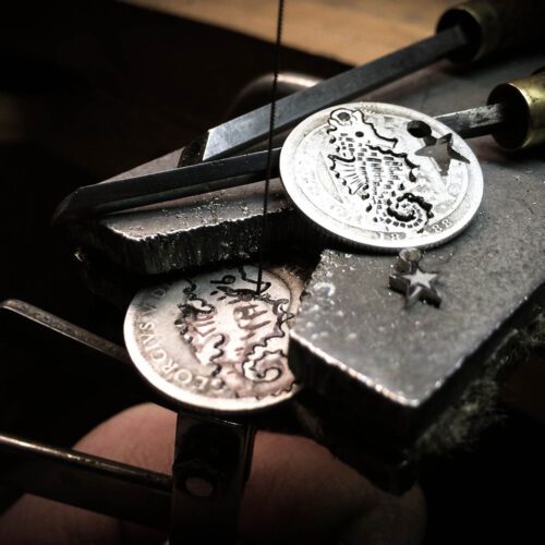 Handmade and repurposed silver shilling seahorse necklace
