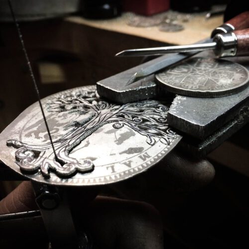 Handcrafted and recycled silver Tree of Life necklace made from a silver crown coin