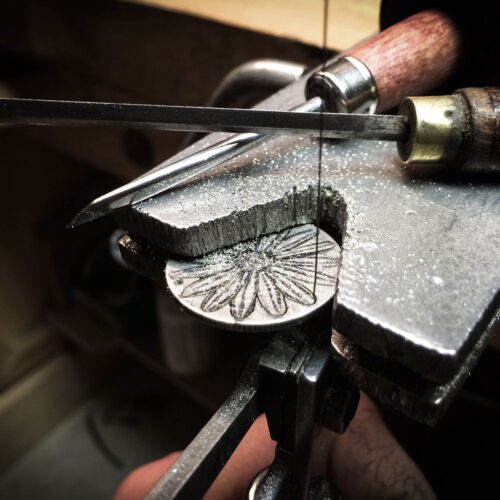 Handcrafted and recycled sterling silver shilling daisy necklace