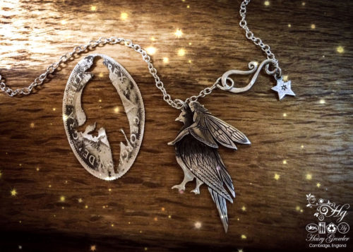 handcrafted and recycled silver fairy and dove necklace