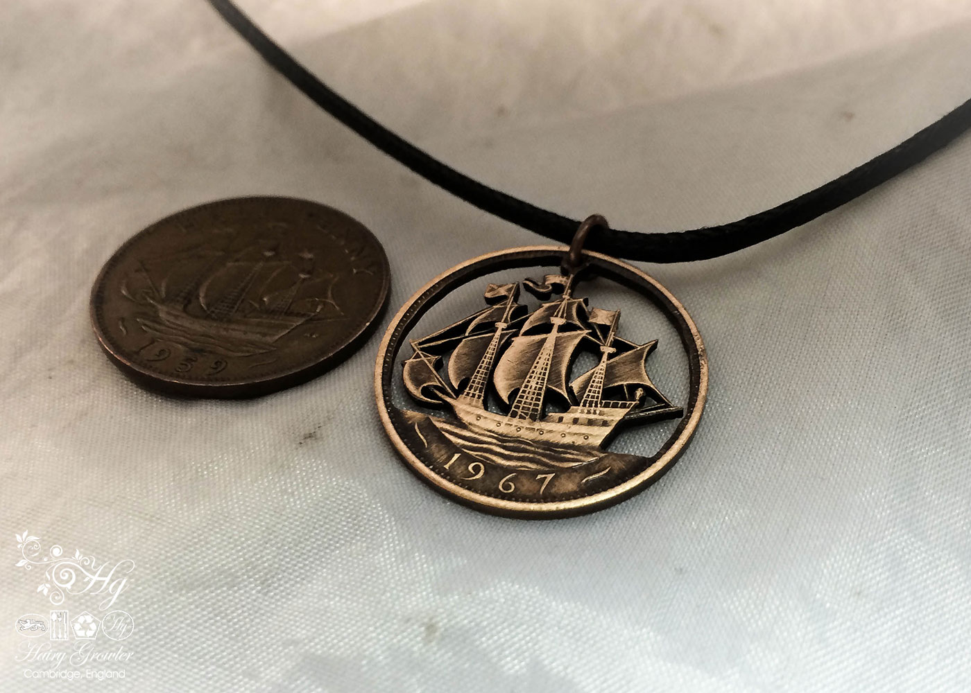 Handcrafted and repurposed Golden Hind ship coin pendant necklace