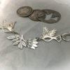 Hand made and repurposed sterling silver beautiful sparkling doves and lotus flower necklace made from silver shillings