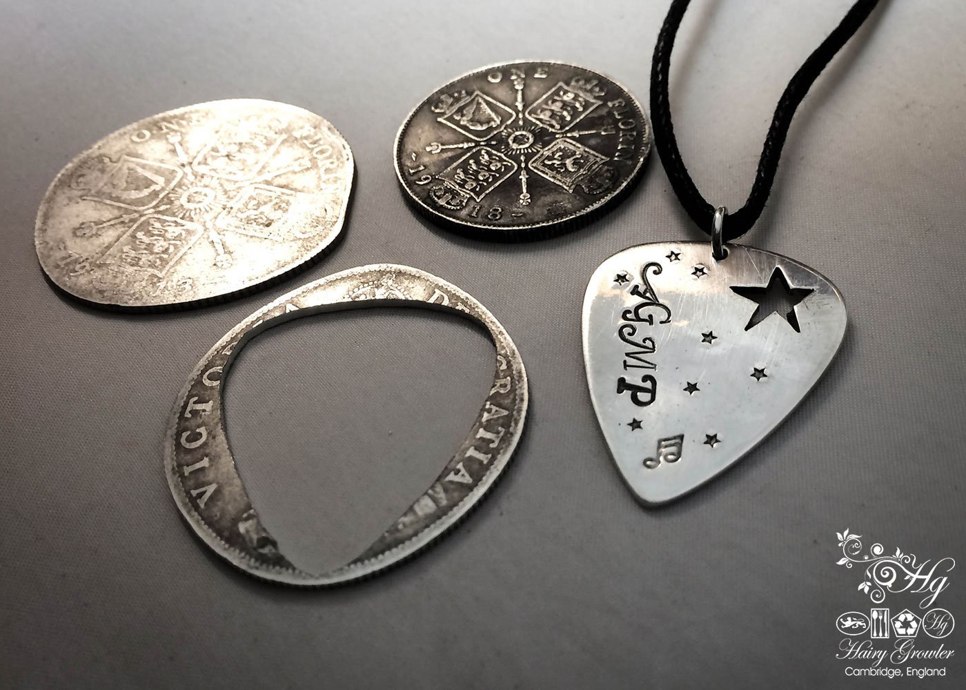handcrafted and recycled silver coin plectrum necklace