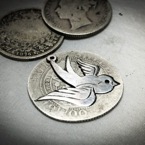 handmade and recycled silver coin swallow necklace pendant