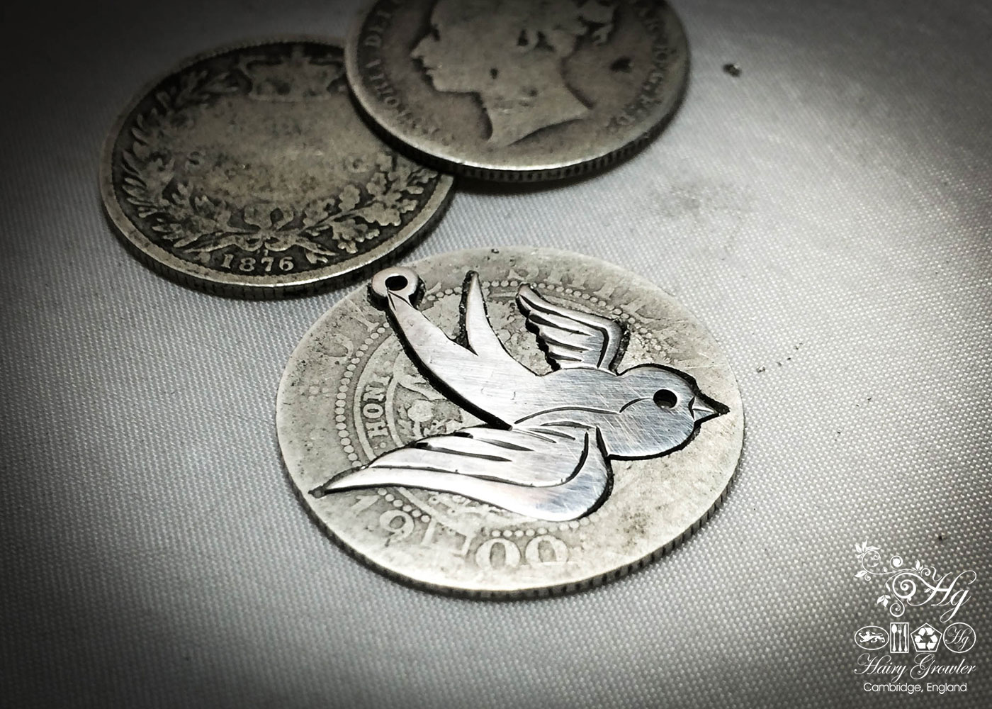 handmade and recycled silver coin swallow necklace pendant