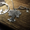 Handmade and upcycled silver Summer tree and tweeting bird made from a silver coin