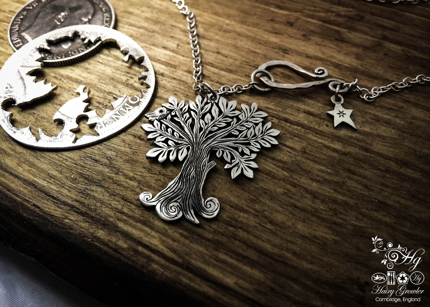 Handmade and upcycled silver Summer tree and tweeting bird made from a silver coin
