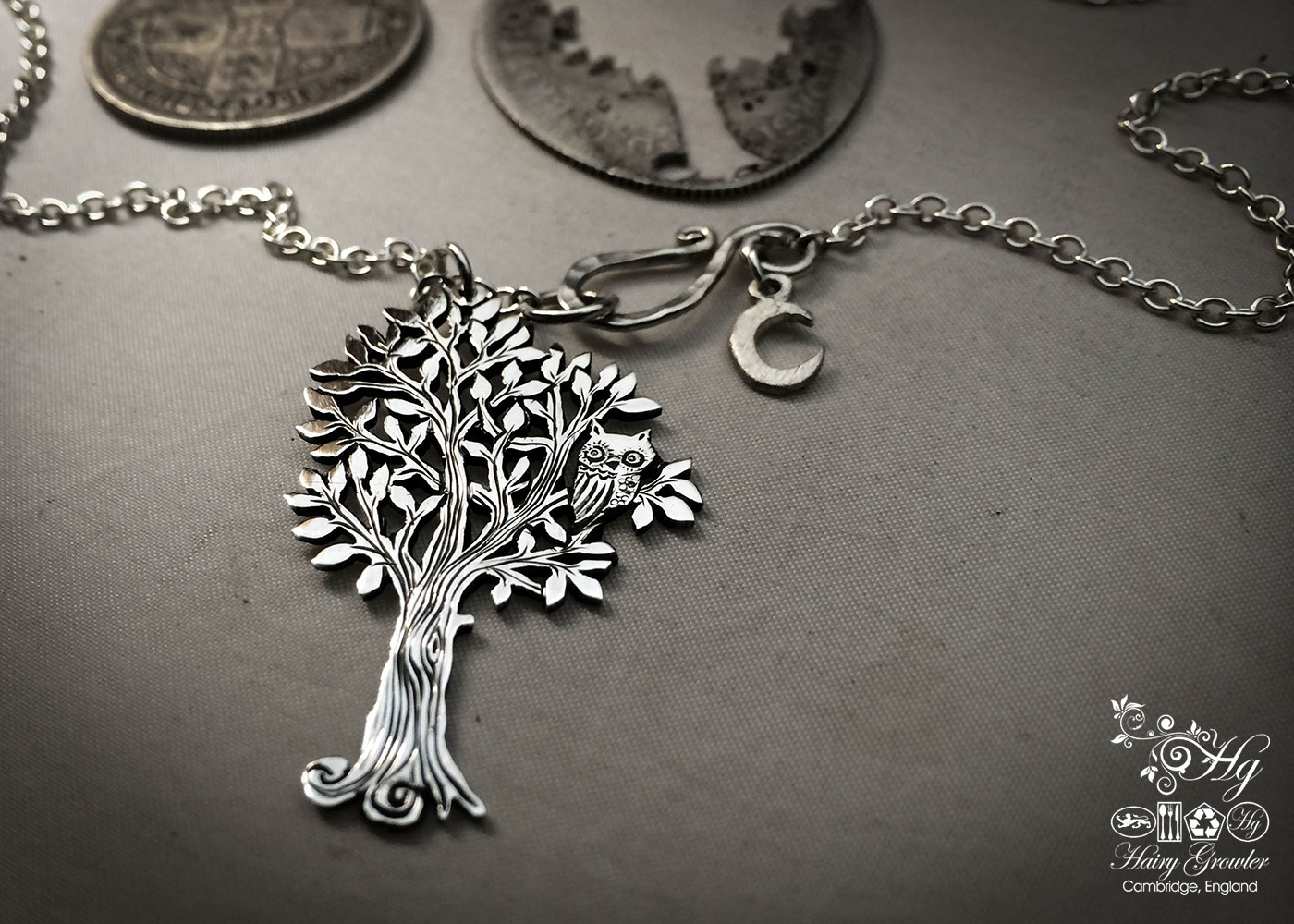 Handmade and repurposed silver woodland tree with owl sitting in the branches