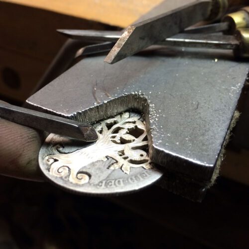 handcrafted and recycled silver coin bird and tree necklace for lovers. Utterly contemporary and original