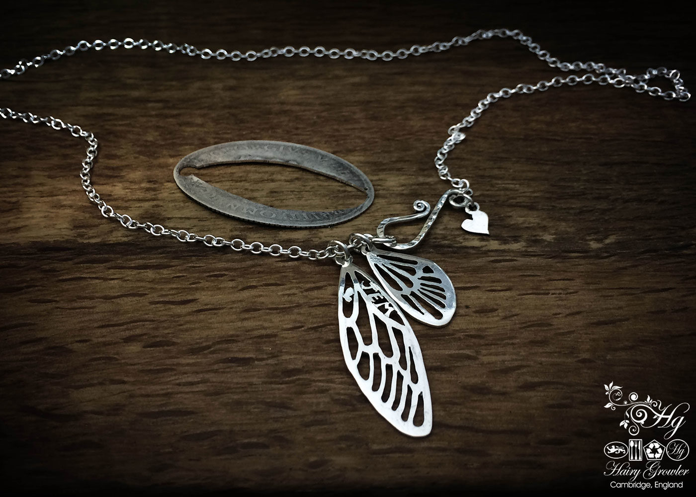 Handmade, recycled, sterling silver fairy faerie wings necklace being handmade