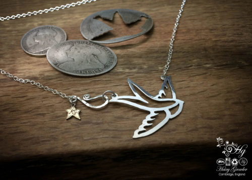 Handcrafted and recycled sterling silver freedom and love necklace