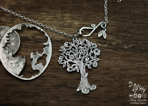 Handmade and repurposed silver Summer tree and tweeting birds made from a silver coin