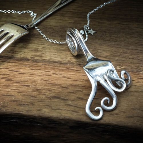 Handcrafted and recycled antique cake fork necklace