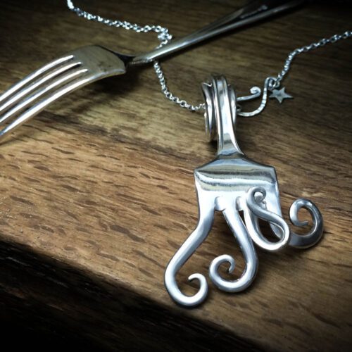 Handcrafted and recycled antique cake fork necklace