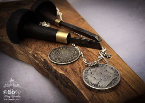 moon gazing hare necklace handcrafted and recycled from three silver shilling coins all over 100 years old