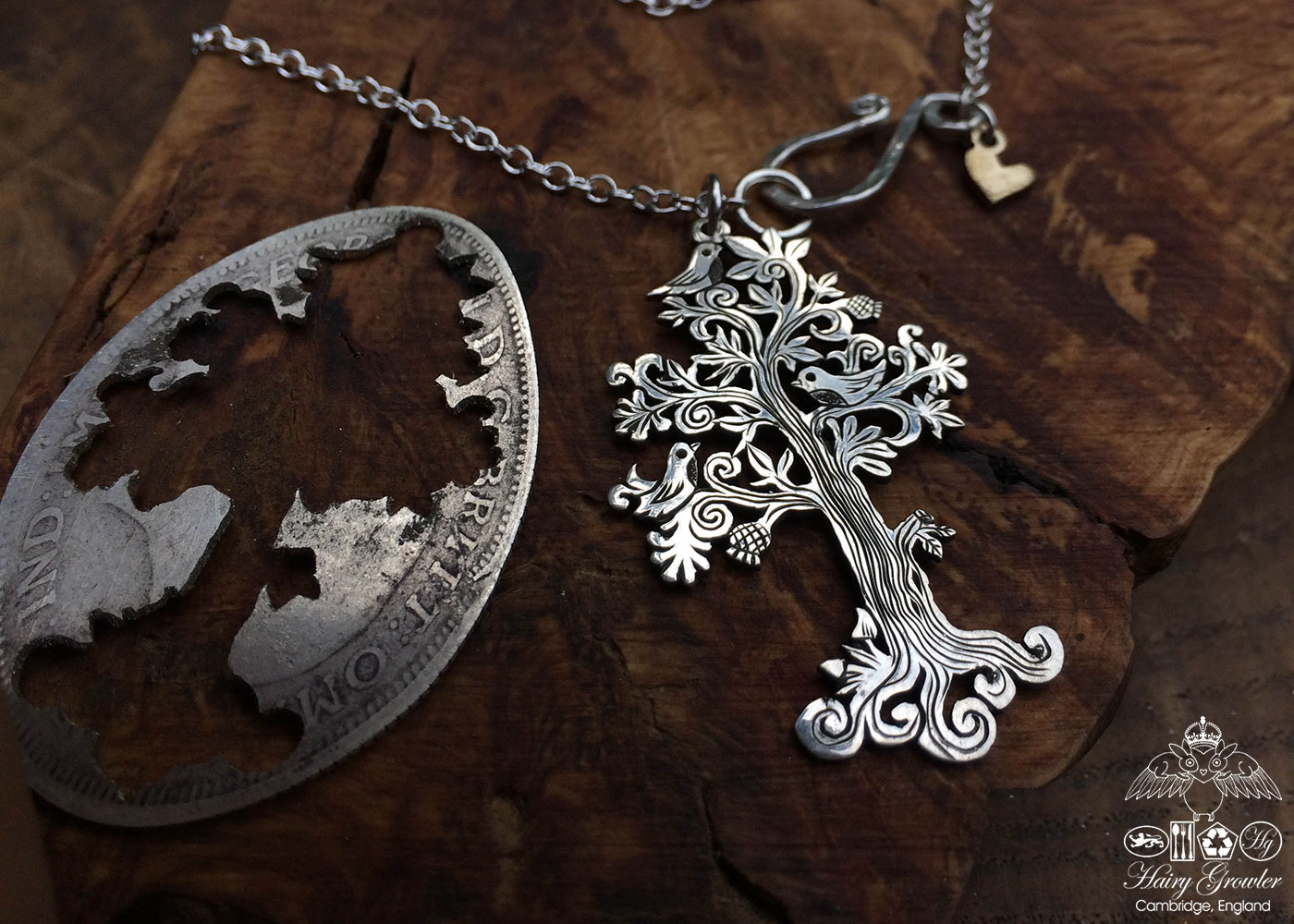 Handcrafted and recycled silver Summer tree and tweeting birds made from a silver coin