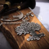 Handcrafted and recycled silver Tree-of-Life necklace made from a British silver coin