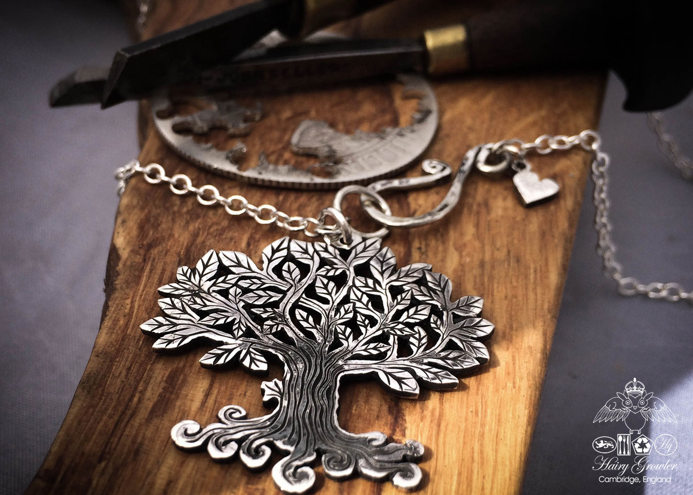 Handcrafted and recycled silver Tree-of-Life necklace made from a British silver coin