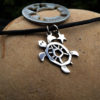 Handcrafted and recycled silver shilling Turtle necklace