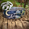 Handcrafted and recycled silver kuff bracelet leaping and dashing hares
