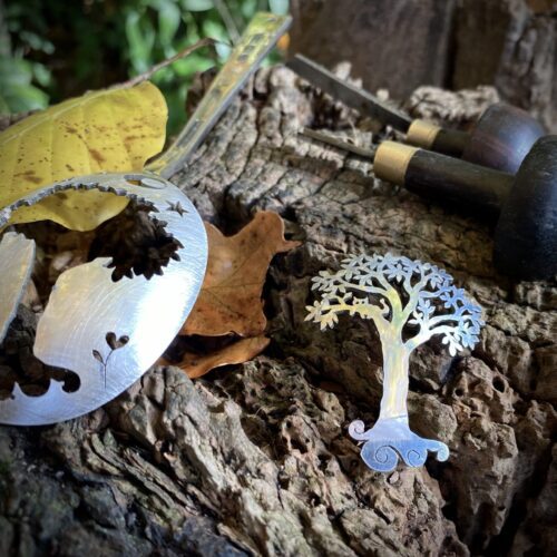 recycled up cycled spoon jewelry cat in a tree brooch. Handcrafted by the Hairy Growler, Cambridge