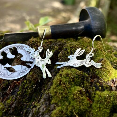 silver coin leaping running hare rabbit earrings