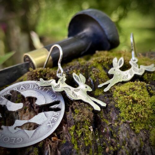 silver coin leaping running hare rabbit earrings