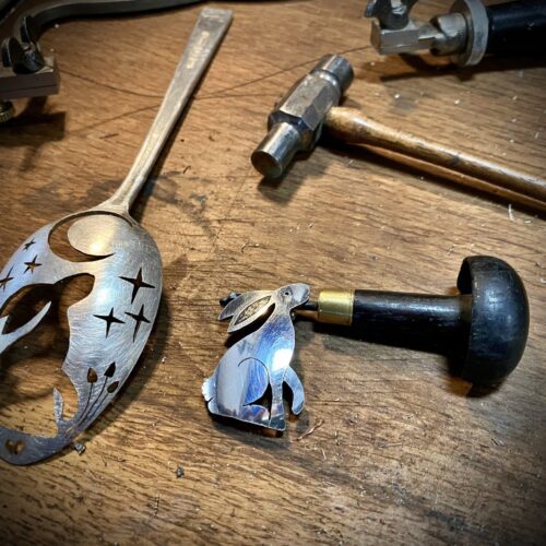 moon gazing hare brooch made from upcycled flatware, repurposed spoons, cutlery by hairy growler jewellery
